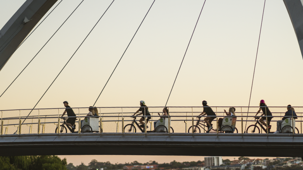 Dusk Rickshaw Rides Across Perth's Bridges